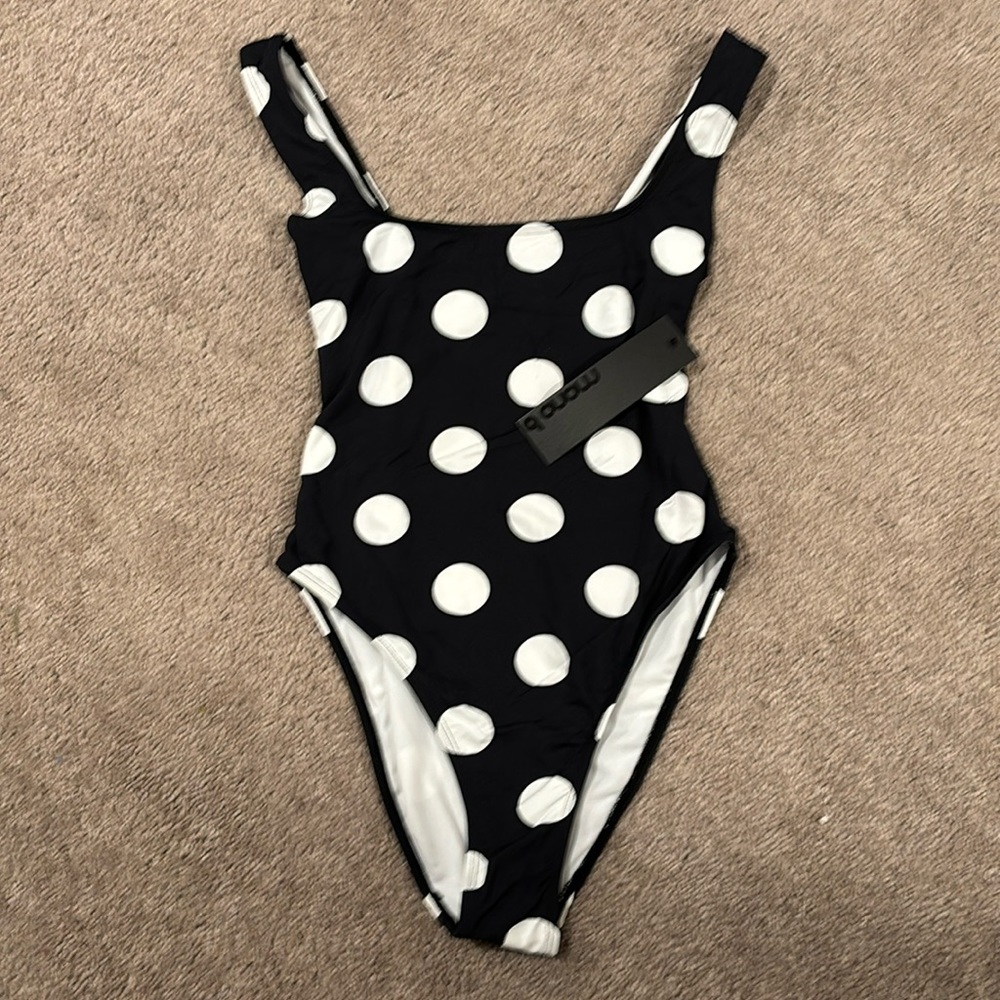 Polka dot bathing suit.